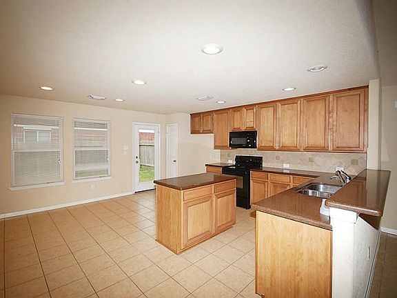 Open kitchen with plenty of room for your dishes.