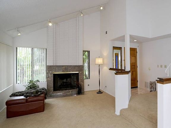 Granite-faced fireplace in Living Room