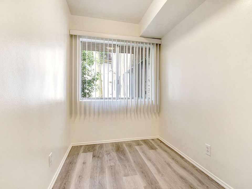 Dining area with wood inspired floors