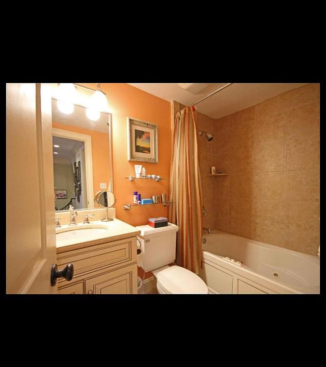 Bathroom with jetted bathtub