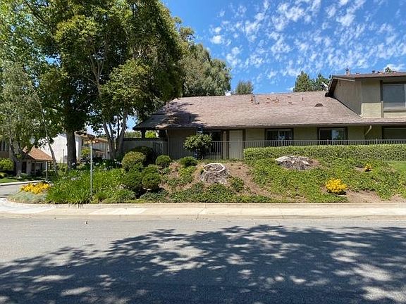 Lower Corner Condo with Shaded Private Patio