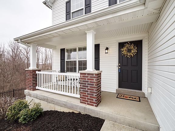 Welcome to 5525 Emerald Ridge with beautiful common ground to the left of the property.