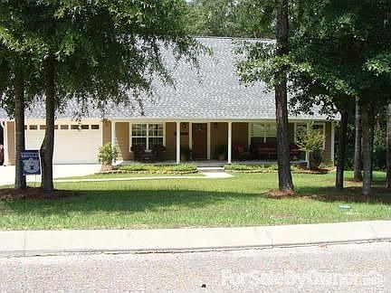 Front of House
						:
						Wooded lot, covered front porch