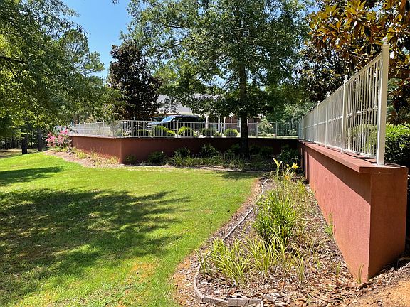 Retaining wall near the parking area.
