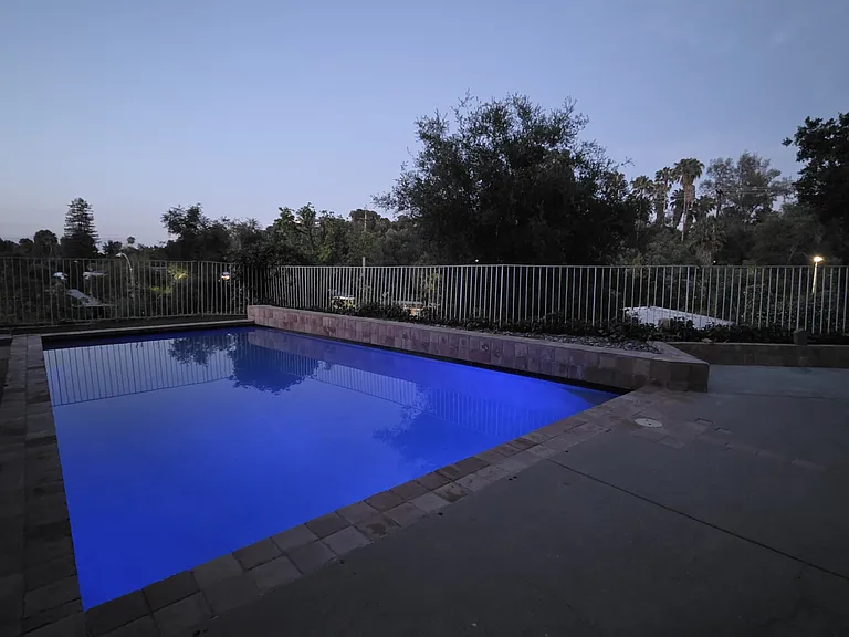 Pool at night with led light that can change color. Very cool and fun.