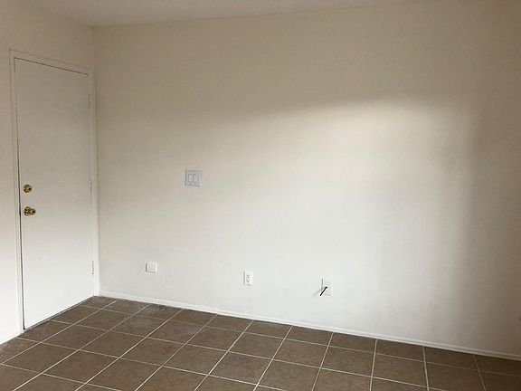 Entry door and east wall