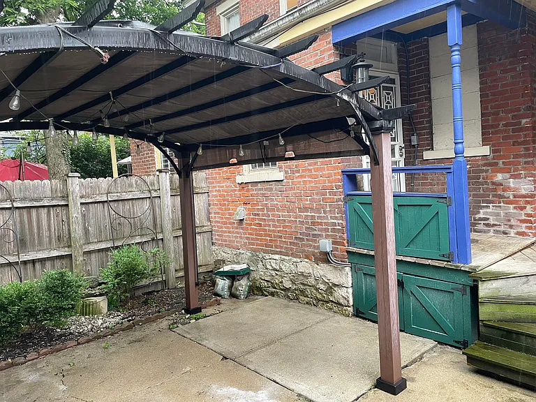 Gazebo with tarp to keep the rain out.