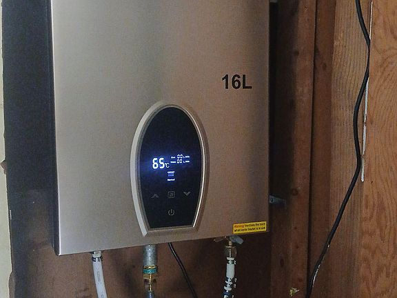 An upgraded gas tankless water heater is has been installed allowing for endless available hot water throughout the house.
