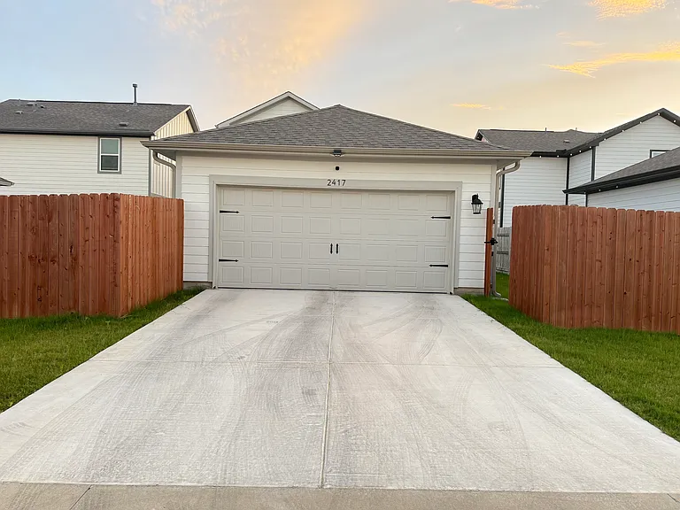 2-Car Garage with 2-Car Driveway Parking Space