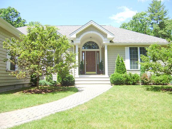 Welcoming entrance with stone pavers