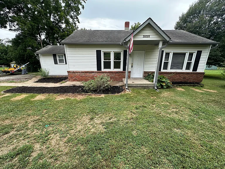 20201 E Truman Rd — Photo 1