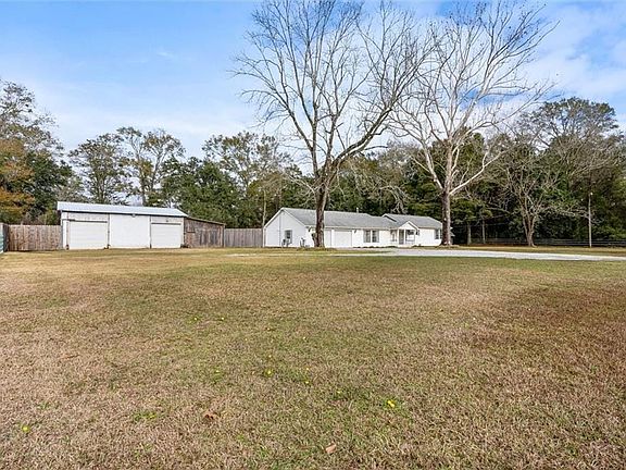 View of front yard and front of subject.