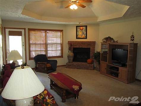 Spacious Living Room with gas fireplace.