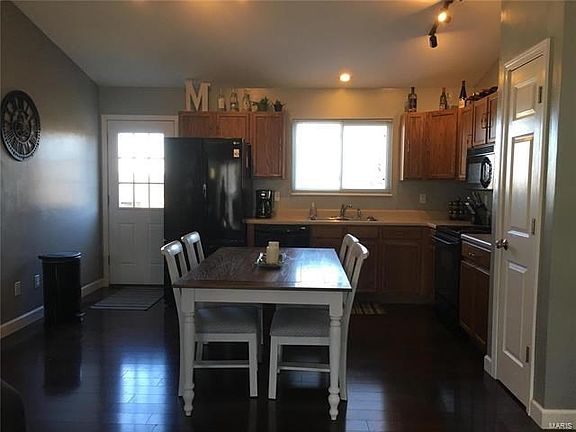 Lots of room in this kitchen with pantry.  Walk out to your large deck for BBQ's