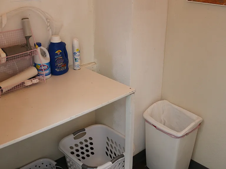 Laundry room area with shelf and washer/dryer (not pictured).