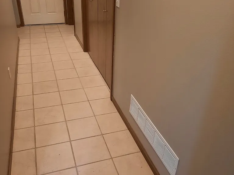 Downstairs laundry closet with hookups for washer and dryer. Downstairs half bath off of entry door.