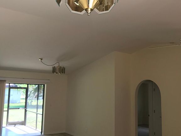 Living/Dining area with Cathedral Ceiling