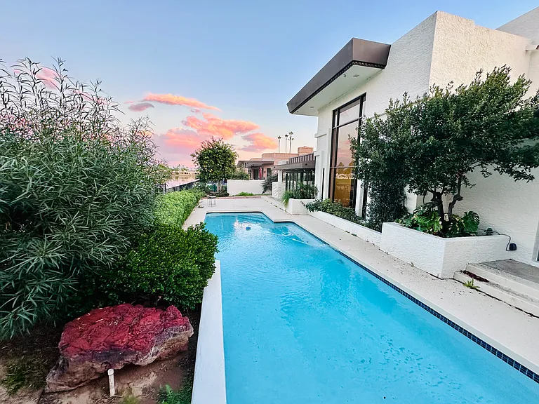 Backyard of the house with swimming pool.