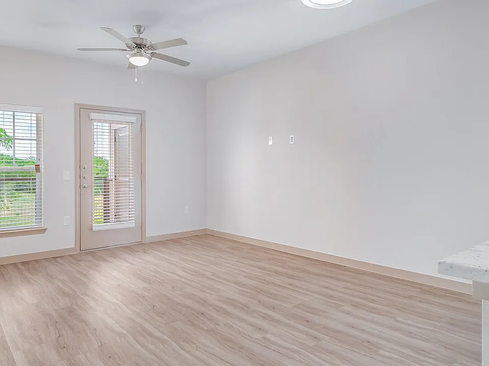 Spacious Living Area with Private Balcony