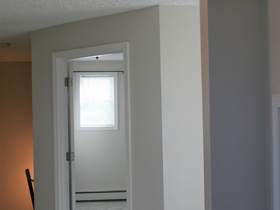 Hallway view to bedroom and down to entrance