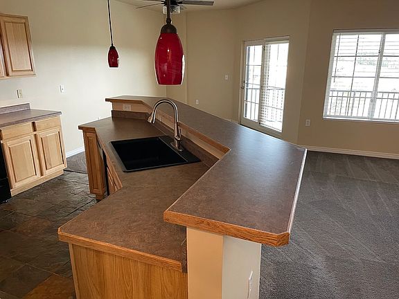 Large kitchen island facing windows