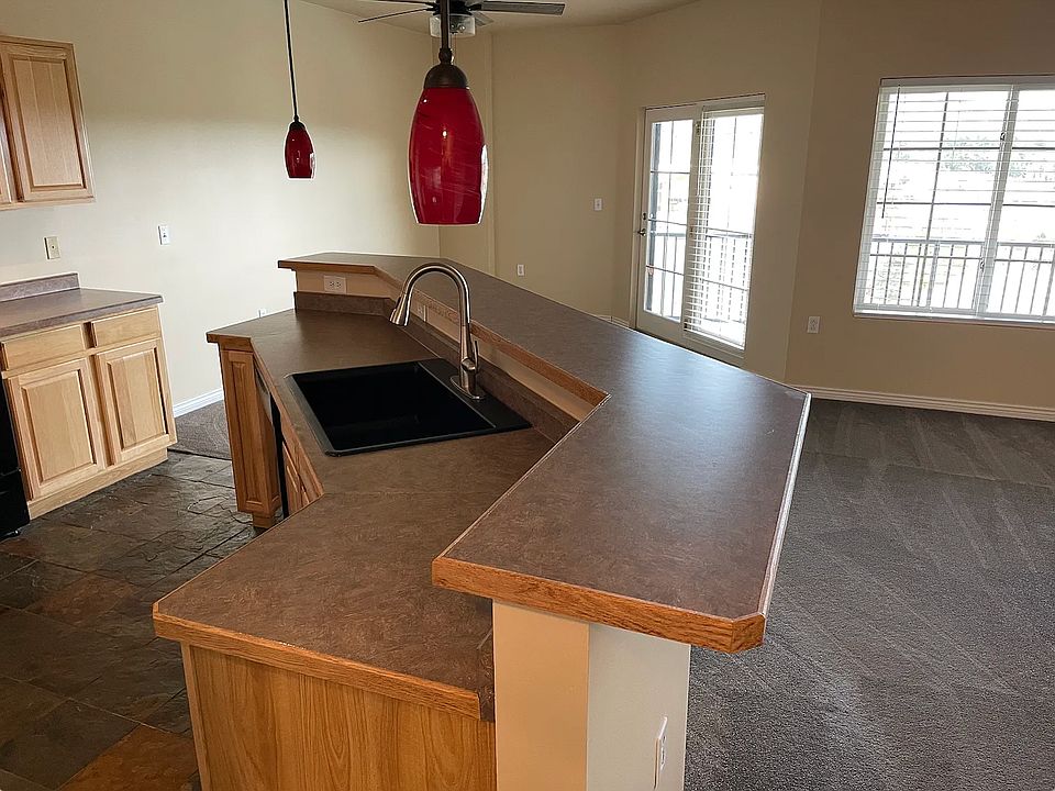Large kitchen island facing windows