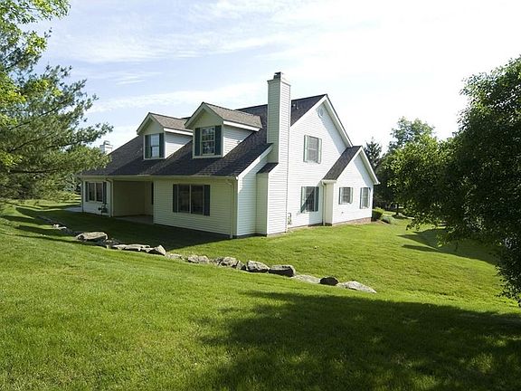 Beautiful landscaping and the private and fenced back of the property.