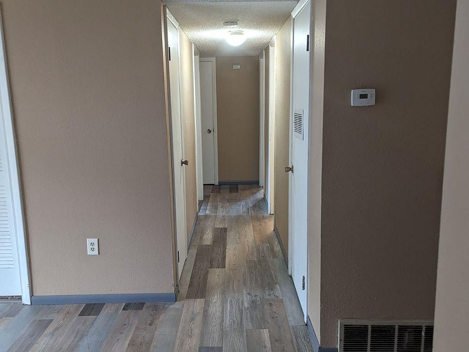 Living room down hallway to bedroom #1, #2 and bathroom