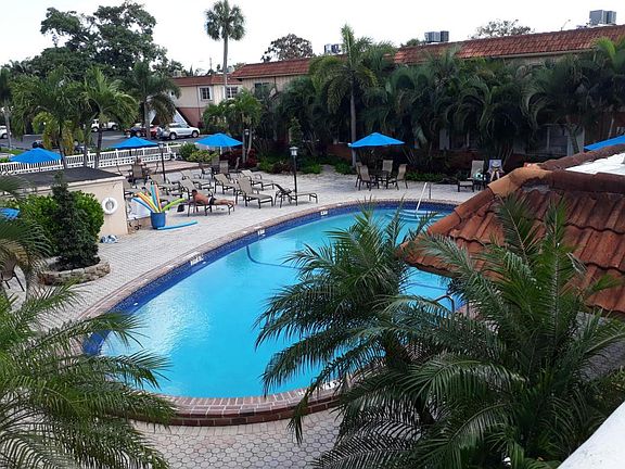 Large Heated Community Pool and Sundeck Area