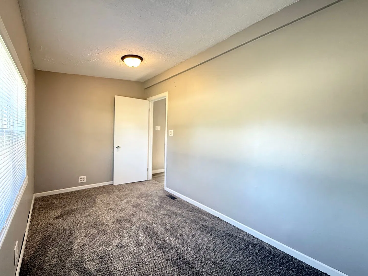 Lake Manawa Neighborhood | 1 Bed + Bonus Room & Garage — Photo 3