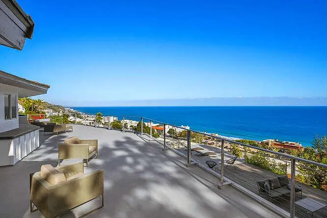Discover a peaceful sitting area outside each bedroom on the second floor, perfect for enjoying moments of relaxation and taking in the surrounding beauty.