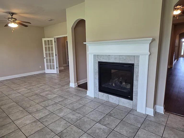 Double sided fireplace from sunroom