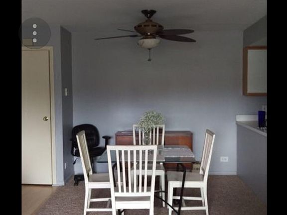 Dining room also has laminated flooring