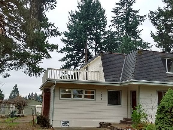 House with garage in back