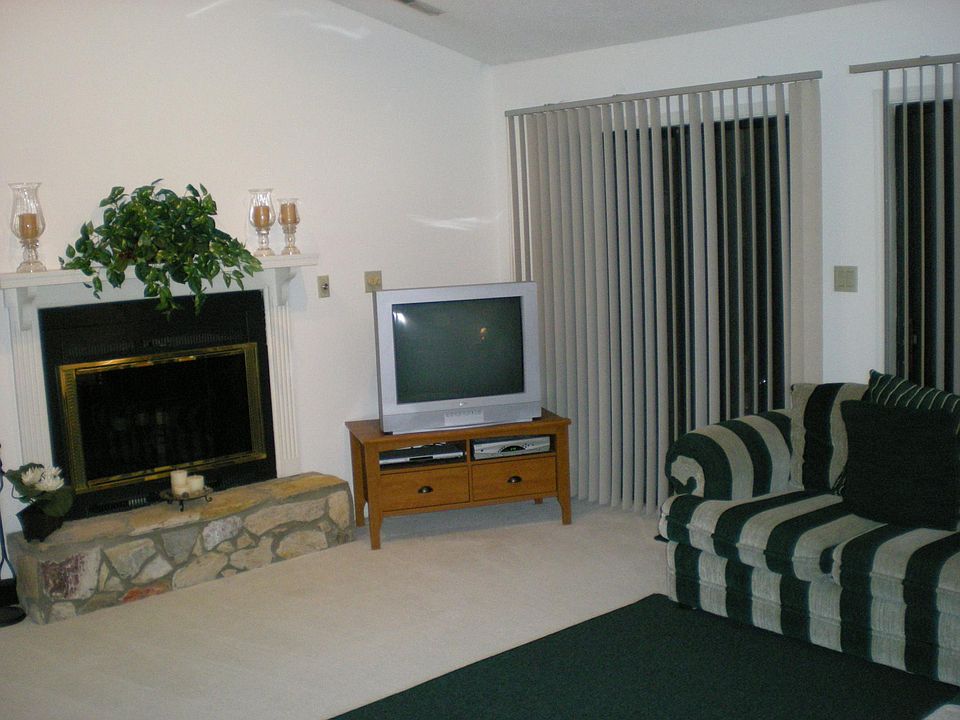 Living room with high vaulted ceiling