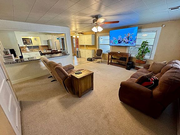 View of living, dining & kit