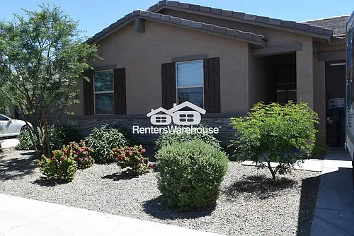 8825 W Albeniz Pl Photo 1