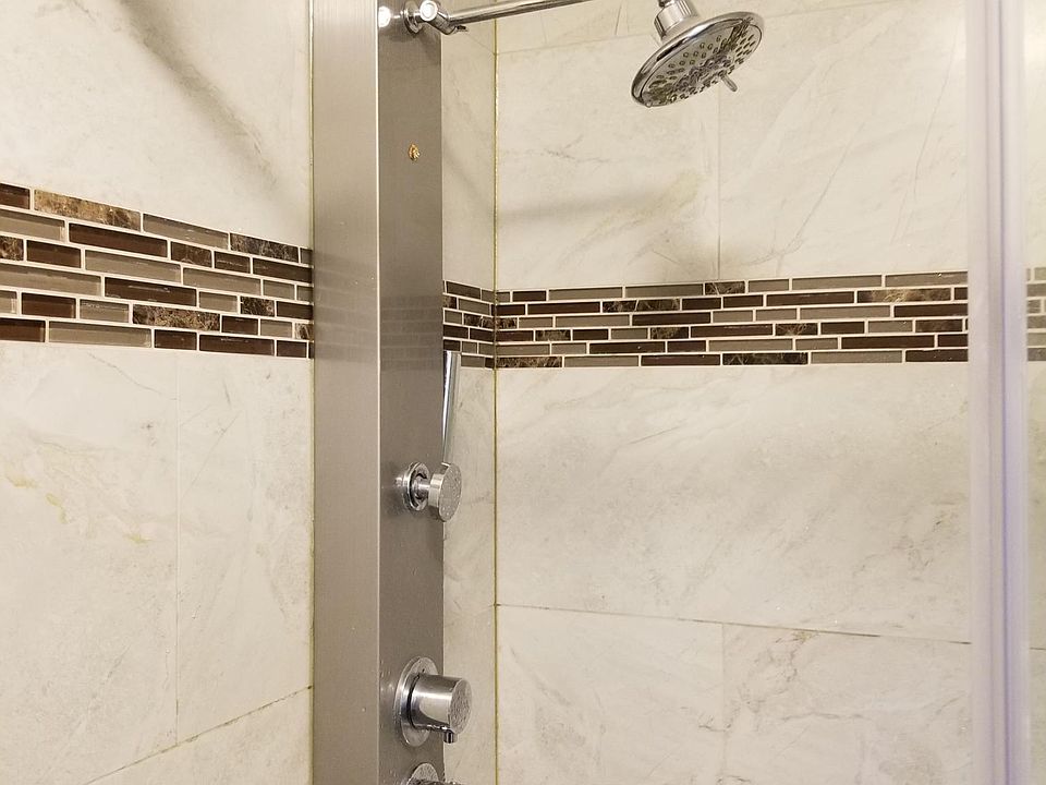 Master bed washroom with shower panel