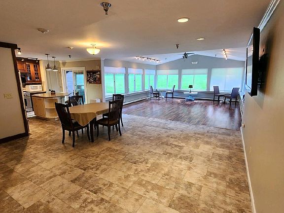 Apartment is very bright & spacious! Lots of light coming from the sunroom windows!