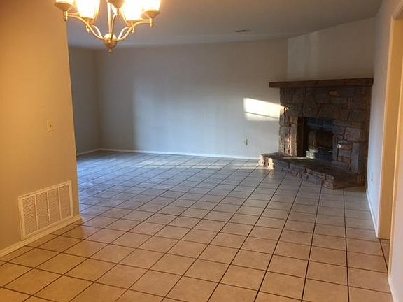 Tiled throughout living areas