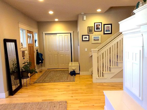 Entrance with coat closet.