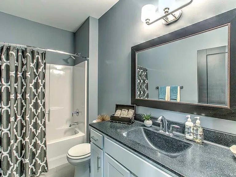 Our bathrooms include spacious vanities with storage, perfect for keeping your essentials organized.