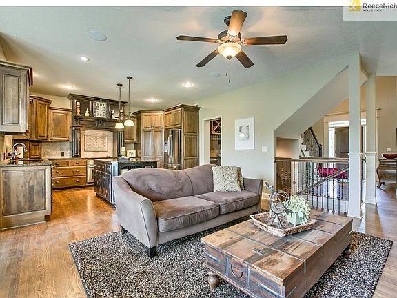Hearth room is open to kitchen and breakfast nook! Complete with fireplace and cable outlet above fireplace!