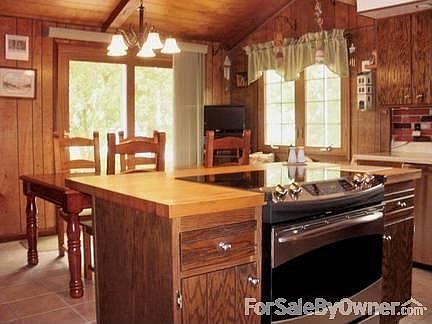 Kitchen- Eating Area looking out to deck : All new Stainless Steel Appliances plus Lots of storage &