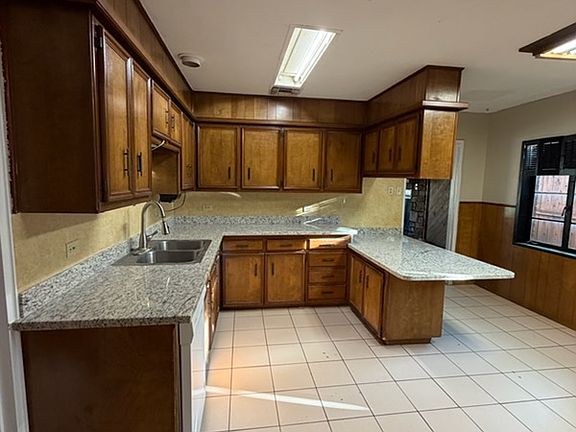Kitchen (before new lights). View from dinette / game room.