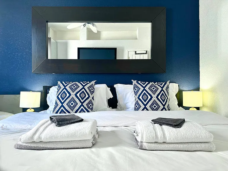 Choose between 1 King Bed or 2 Twin Beds and 1 Twin Bed for a comfortable stay.