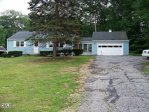 Front of house sits off road