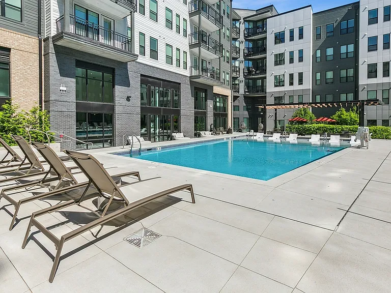 Kick back and relax by the sparkling pool with plenty of comfortable loungers and sun-soaked space.