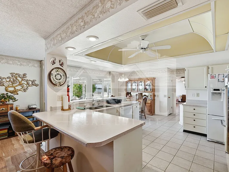 9807 W Mockingbird Dr — Photo 12