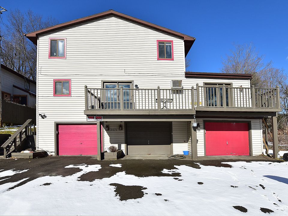 3571 Smith Dr Apt #1.
Center and right garages belong to Apt #1.